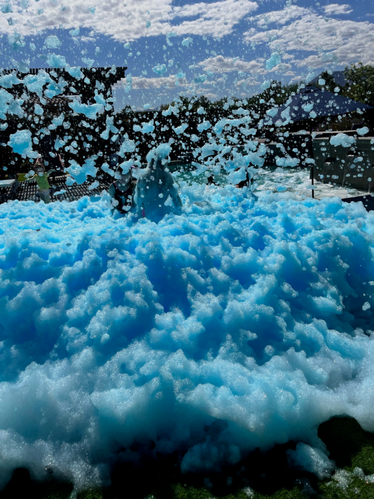 people enjoying a colored foam party from Great Lakes Foam outdoor entertainment
